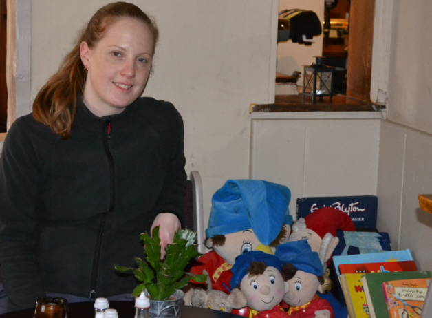 Corinna at the Red Lion Pub with their Blyton stash.