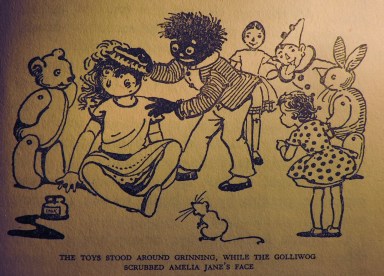 Golly scrubs the ink of Amelia Jane's face