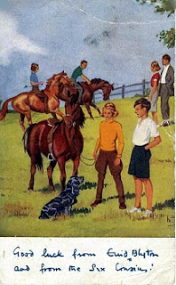 The postcard, featuring the Six Cousins.