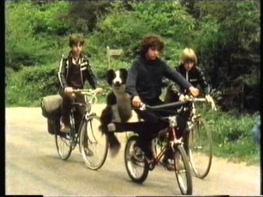 Dick (Gary Russell), Timmy (Toddy), George (Michele Gallagher) and Richard Kent (Grant Bardsley) on their bikes in Five Get Into Trouble. 
