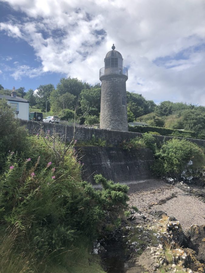 small grey lighthouse