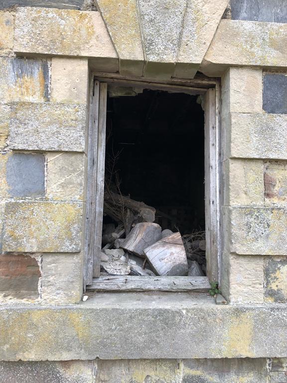 looking in a window of the ruins of glassaugh house